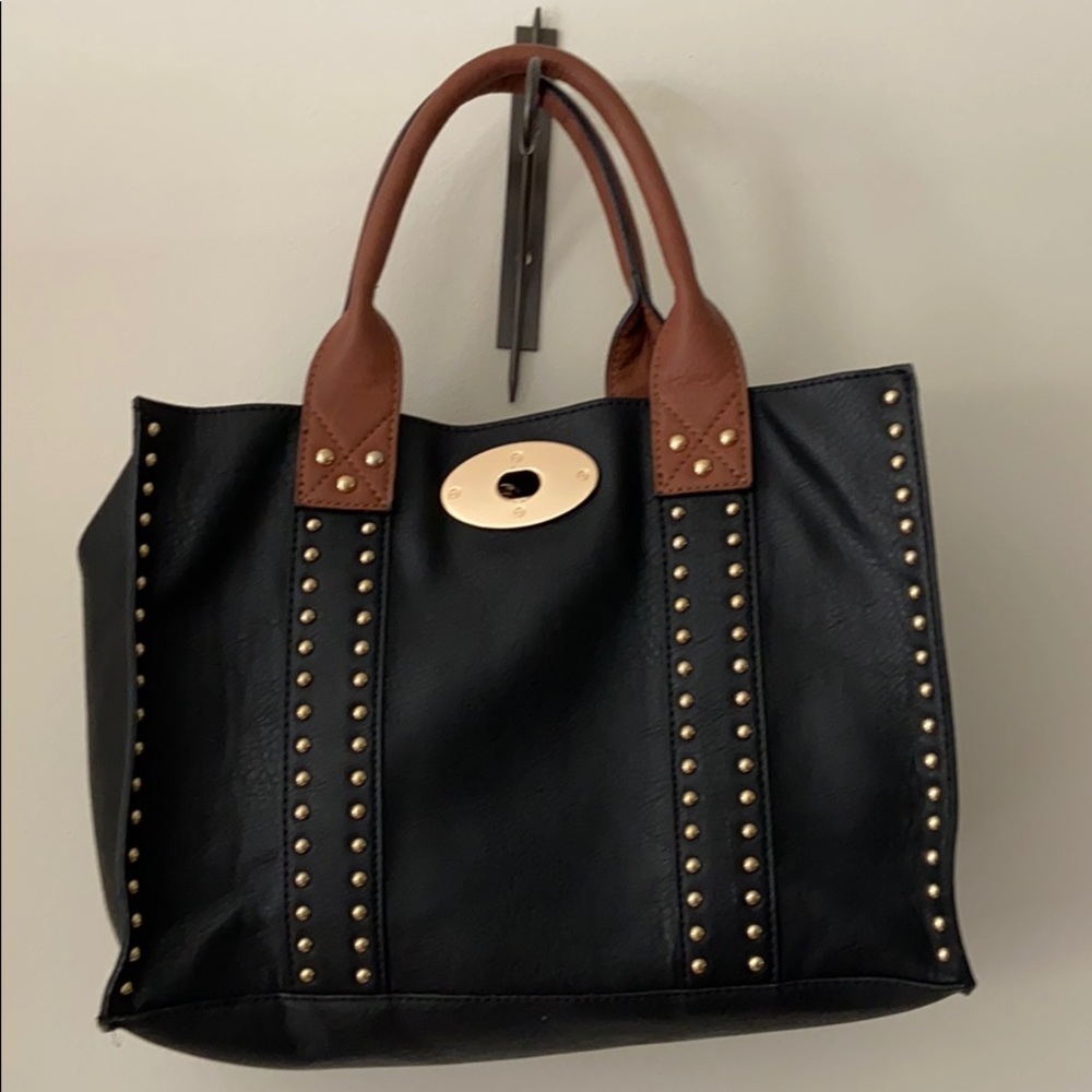 Black leather tote with brown straps